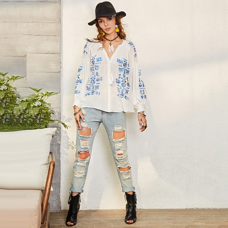 Jenny - White blouse with blue embroidery