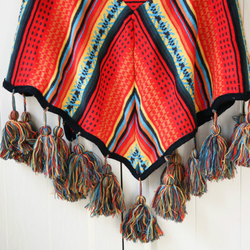 Ramona - Colorful ethnic poncho with tassels