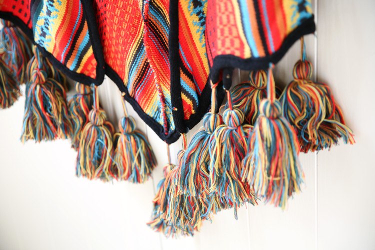 Ramona - Colorful ethnic poncho with tassels